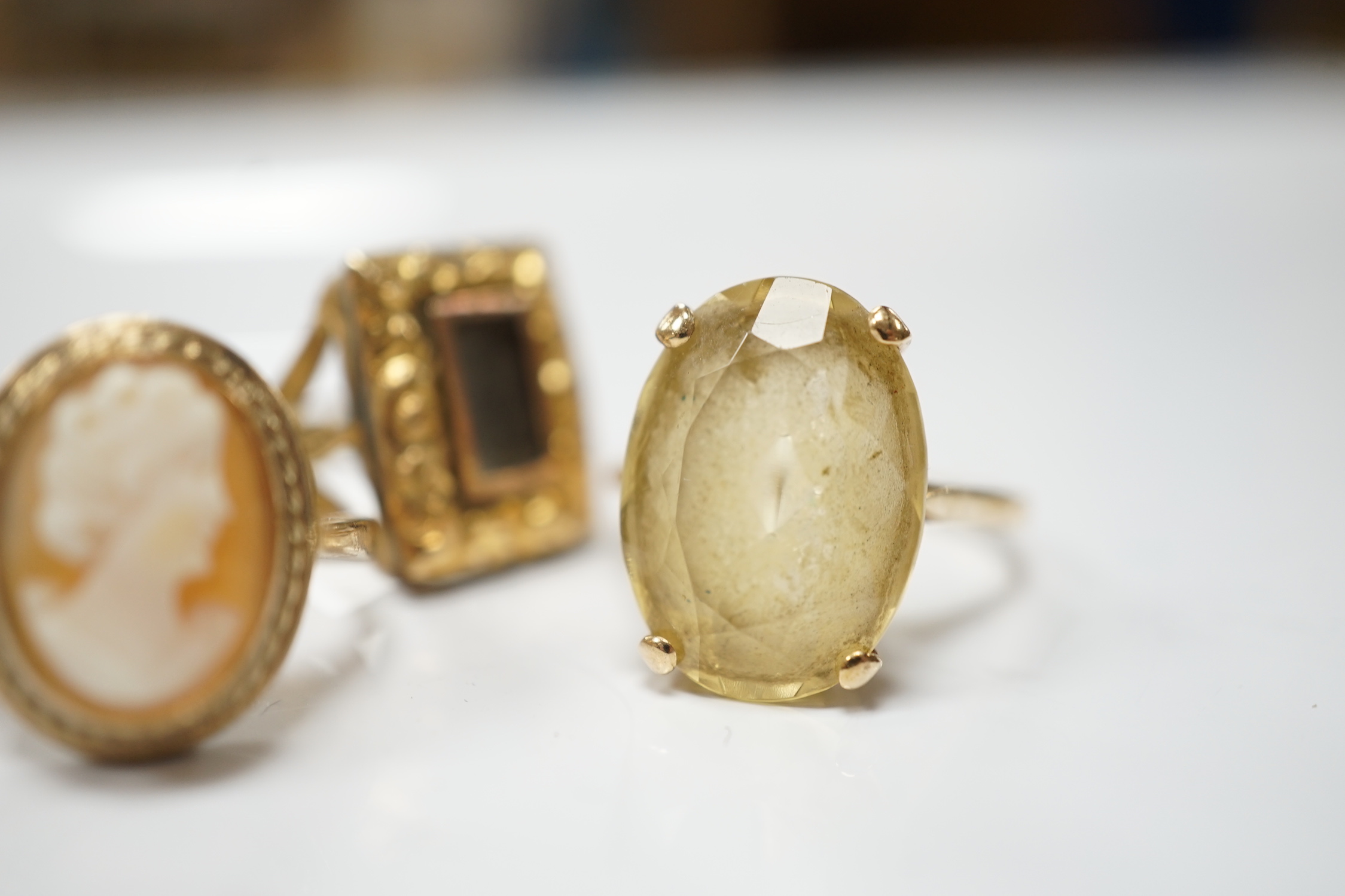 Two 19th century yellow metal mourning brooches, now with shanks converted to dress rings and two other 9ct rings.